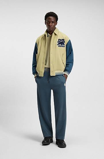 Träningsbyxor BOSS HUGO x RB Oversized-Fit Tracksuit Bottoms with Striped Waistband and Drawstring Mörkblå | 50549308, 1