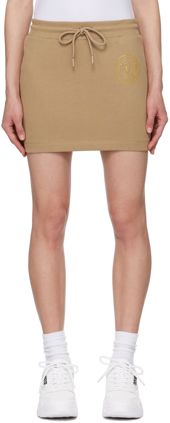 Kjol Versace Jeans Couture Tan V-Emblem Miniskirt Beige | E76HAEG06_ECF01G, 0