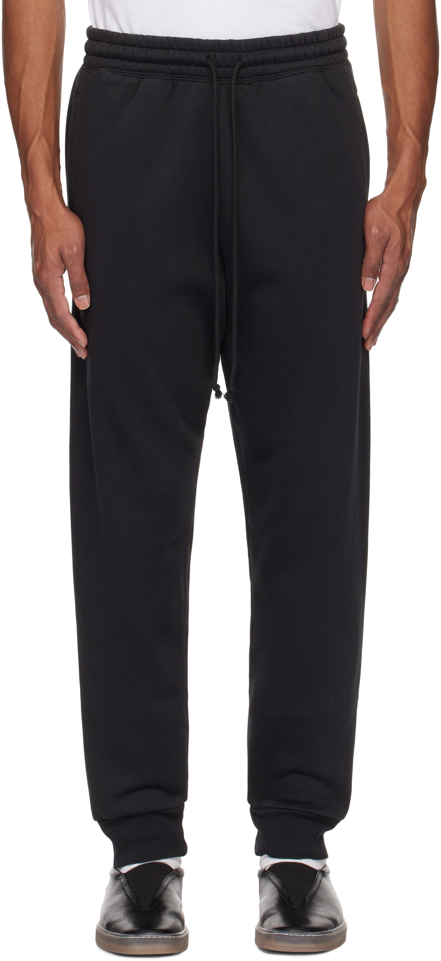 Träningsbyxor SKIMS SKIMS Fleece Tapered Sweatpants Svart | BO-PNT-5428M, 0