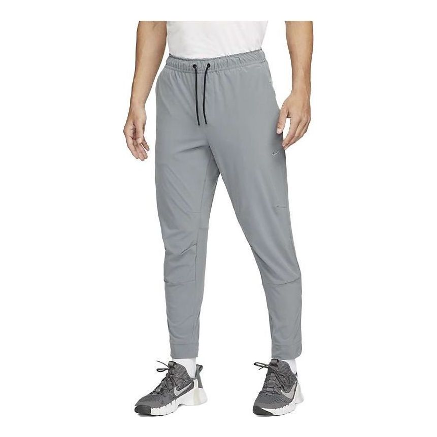 Träningsbyxor Nike Zippered Cuff Versatile Training Pants Grå | FB7549-084, 0