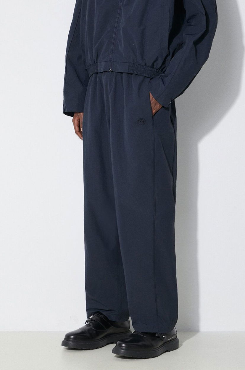 Byxor Ambush Track Pants Blå | BMCJ002S24FAB0014646
