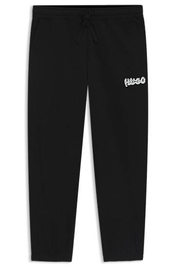Träningsoverall BOSS Cotton-terry tracksuit bottoms with logo print Svart | 50549779, 0