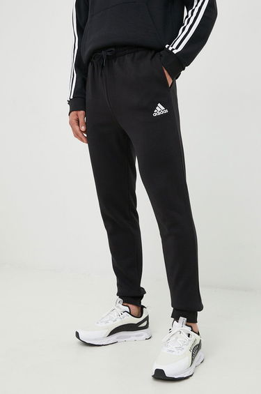 Träningsbyxor adidas Originals Essentials Fleece Regular Tapered Pants Svart | HL2236, 0