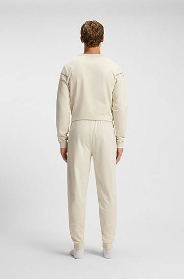 Träningsbyxor BOSS Cotton-terry tracksuit bottoms with side tape and vertical logo Beige | 50550613, 1