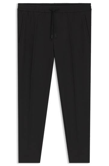 Träningsbyxor BOSS Water-Repellent Tapered-Fit Stretch Trousers Svart | 50538179