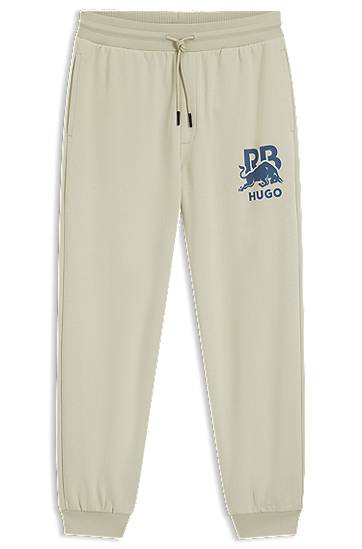 Träningsoverall BOSS RB cotton-terry tracksuit bottoms with bull graphic Beige | 50549309, 0