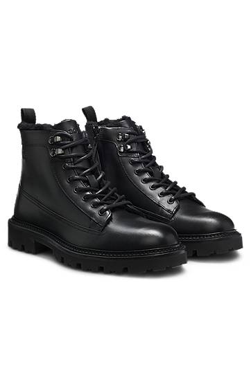 Sneakers och skor BOSS Leather lace-up boots with faux-fur lining Svart | 50552570