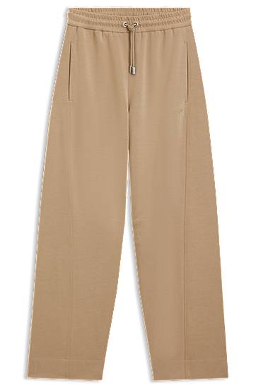 Träningsbyxor BOSS Stretch Jersey Balloon Trousers with Embroidered Logo Beige | 50547800