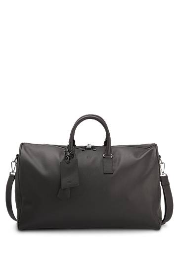 Resväska BOSS BECKHAM x BOSS Grained Leather Holdall with Address Tag Svart | 50549409