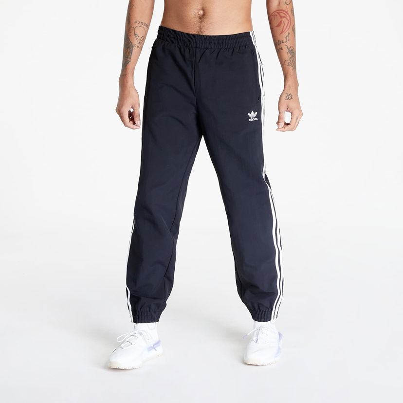 Byxor och jeans adidas Originals adidas Woven Fbird Track Svart | IT2501
