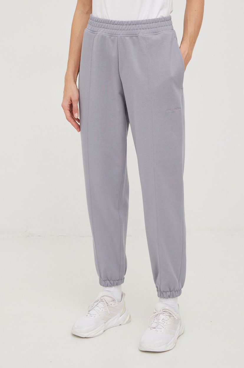 Träningsbyxor New Balance sweatpatns Grå | WP23553SEL