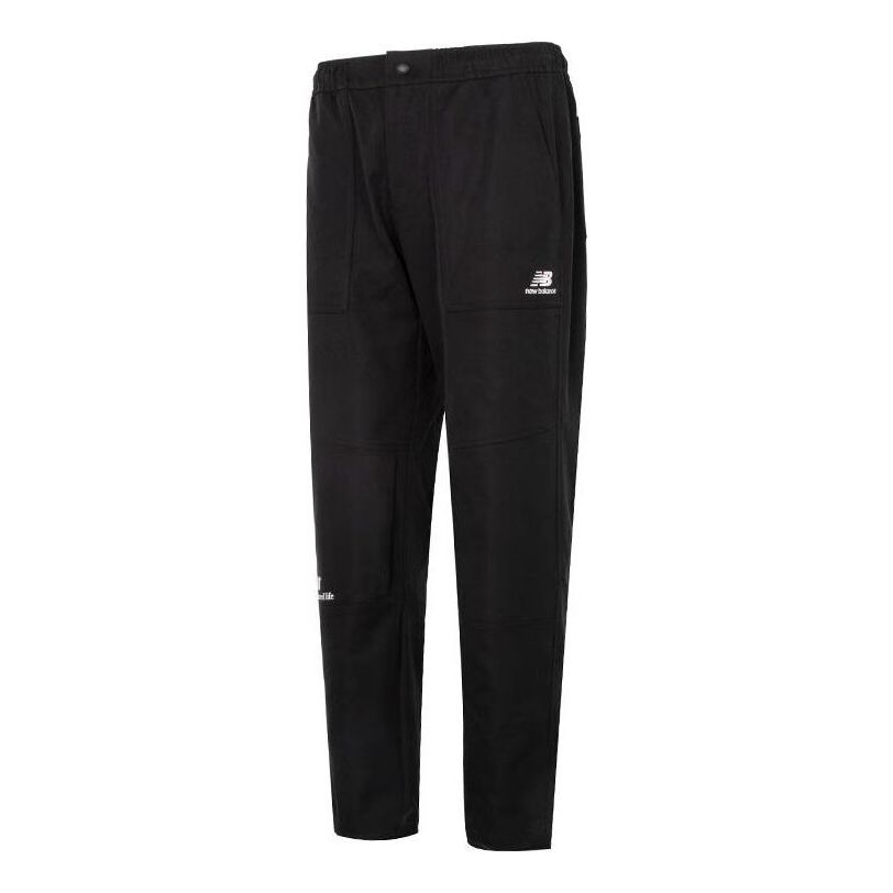 Byxor New Balance Athletics Amplified Pants Svart | 5TC44383-BK