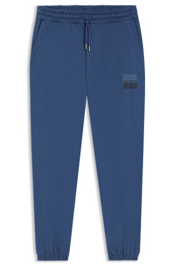 Träningsbyxor BOSS HUGO Cotton-Terry Tracksuit Bottoms with Split Logo Blå | 50542866