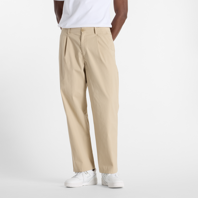 Byxor New Balance New Balance MP51563SOT Pleated Trousers Beige | NBMP51563SOT