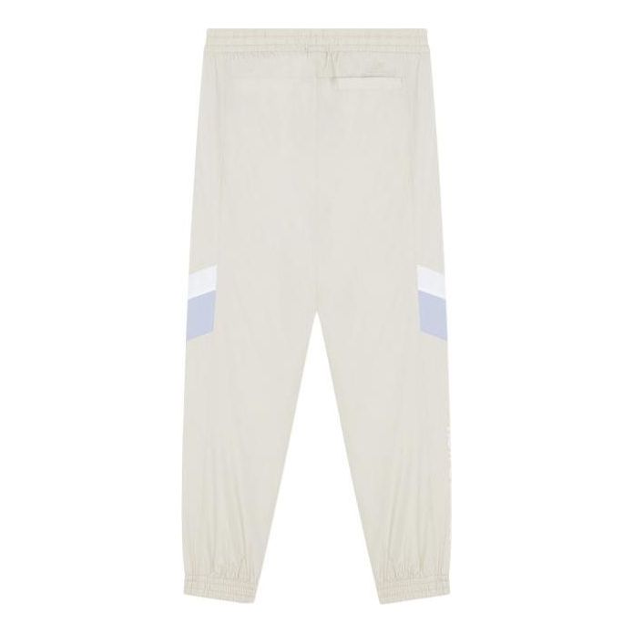 Träningsbyxor New Balance Sportswear Pants Beige | 5TC17133-BEI