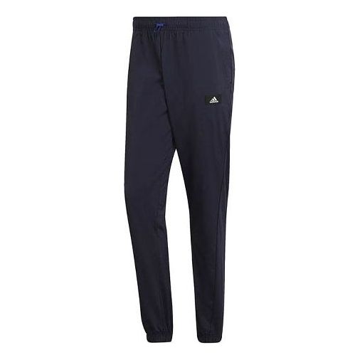 Byxor adidas Originals Training Series Logo Woven Pants Blå | HB6569