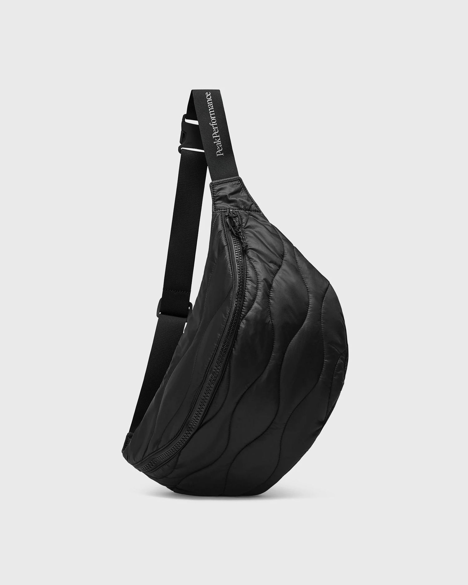 Axelväska Peak Performance Quilted Sling Bag HeliuBuBag Svart | G80248010, 0