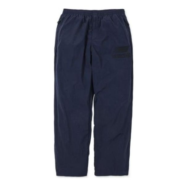 Träningsbyxor New Balance N.HOOLYWOOD x INVINCIBLE(R) Woven Pants Blå | AMP22346-PCT