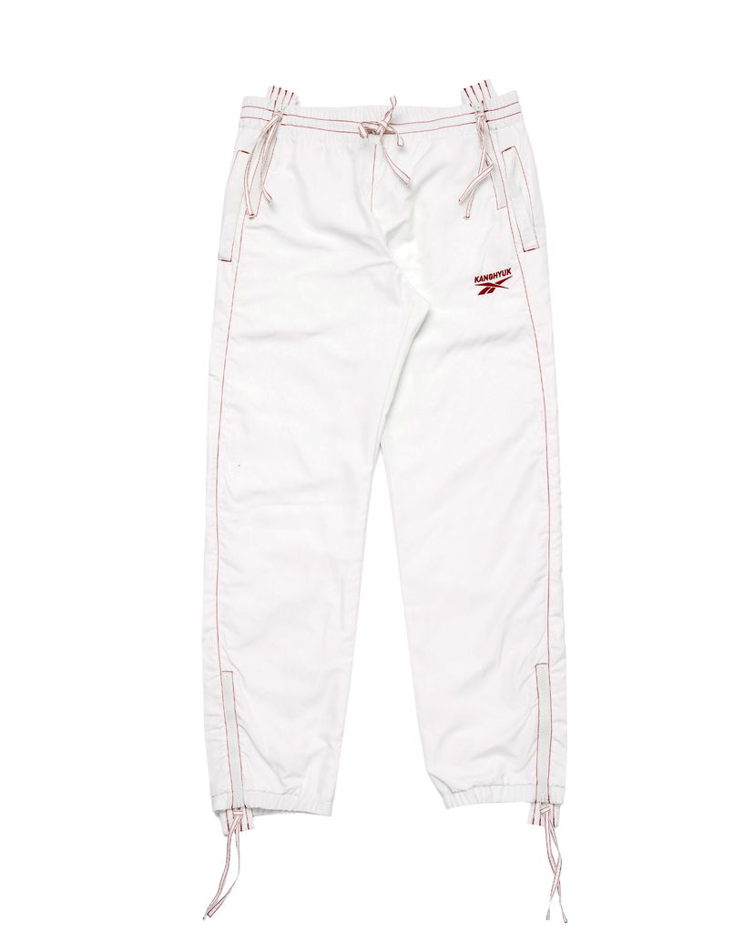 Byxor Reebok Kanghyuk x TRACK PANTS Vit | RMCJ008C99FAB0010300