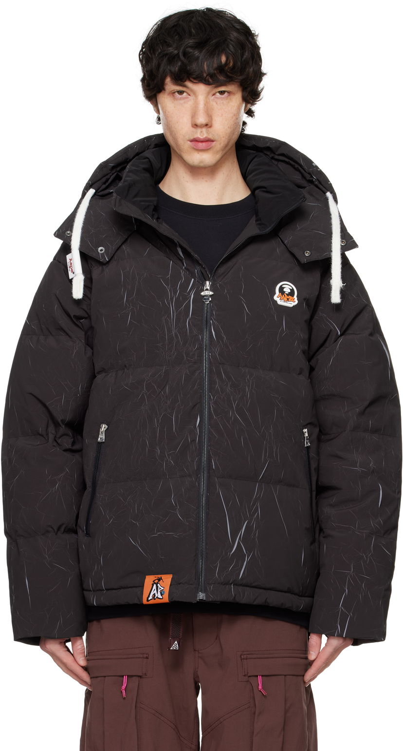 Pufferjacka AAPE by A Bathing Ape AAPE by A Bathing Ape Moonface Logo Camo Hooded Down Jacket Svart | AAPDNM7665XXNBKX