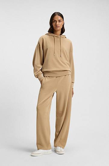 Träningsbyxor BOSS Stretch Jersey Balloon Trousers with Embroidered Logo Beige | 50547800, 1