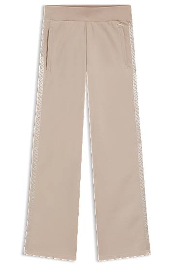 Träningsbyxor BOSS Piqué Jersey Tracksuit Bottoms with Monogram Tape Beige | 50545655