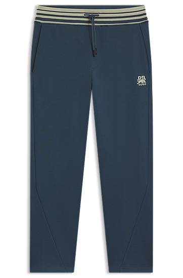 Träningsbyxor BOSS HUGO x RB Oversized-Fit Tracksuit Bottoms with Striped Waistband and Drawstring Mörkblå | 50549308, 0